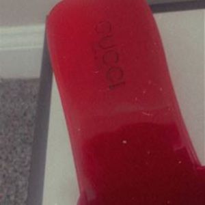 Red Gucci slides